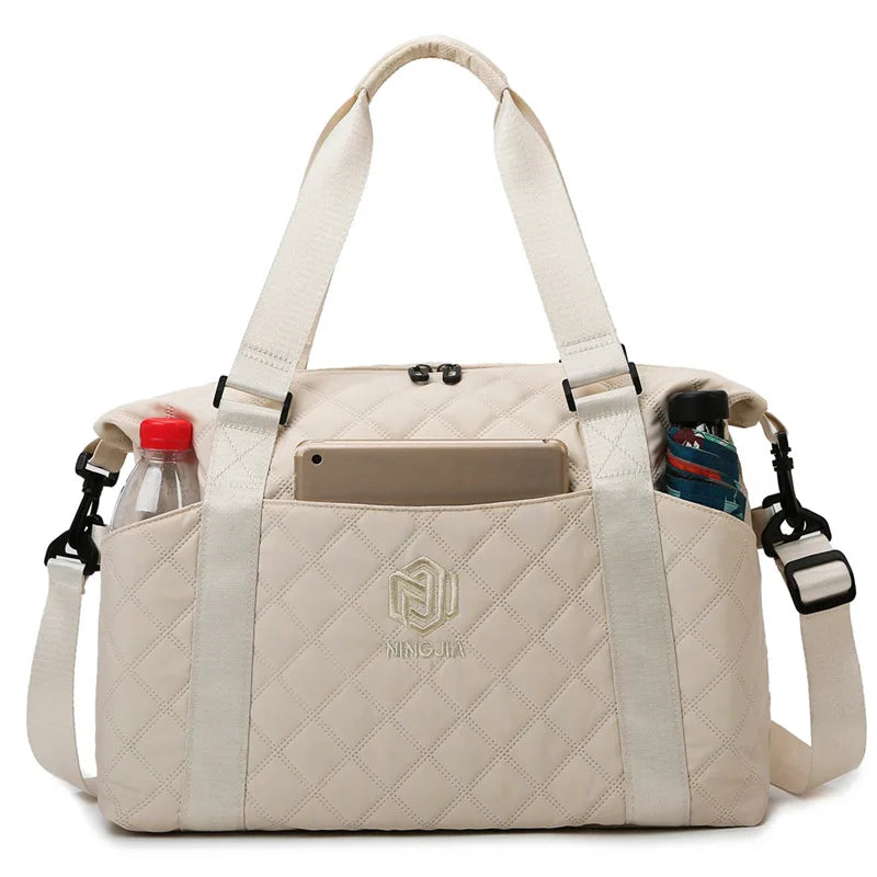 Bolsa de Viagem Feminina em Couro - Alça Ajustável